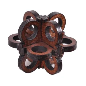 Wooden interlocking brain teaser puzzle detail shot showing the intricate craftsmanship and design.
