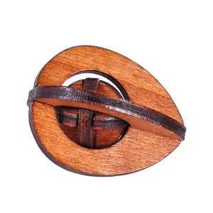 Detailed view of the classic wooden interlocking puzzle showcasing fine texture and structure.