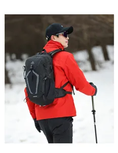 Lightweight waterproof outdoor hiking backpack for men, durable black sports daypack for camping.