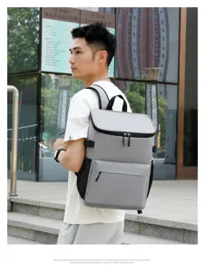 Outdoor grey insulated backpack detail showing large capacity, durable fabric and multi pockets.