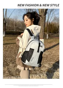 Lightweight waterproof 25L outdoor sports backpack with mesh pockets for hiking and travel.