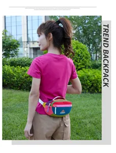Azela color-block waist bag for outdoor travel, vibrant multi color design and zip pocket.