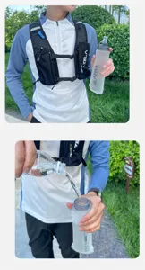 Detail shot of collapsible 500ml soft running flask and vest, perfect for outdoor trail running.