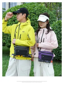 Detailed view of the outdoor crossbody bag with grid fabric and strap setup for hiking poles.