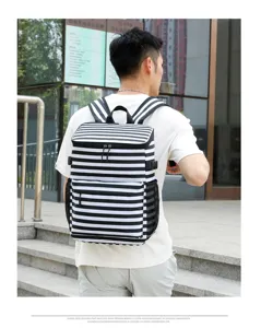 Outdoor insulated cooler backpack with black and white stripes, large capacity for picnic camping.