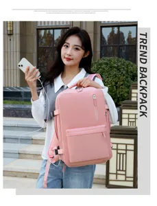 Detailed view of women large capacity pink laptop backpack with multi pockets for travel.