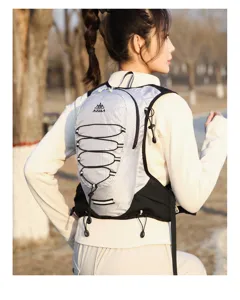Outdoor running backpack detail showing breathable mesh, adjustable cords, and ergonomic fit.