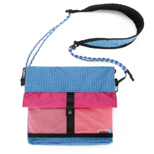 Colorful grid crossbody bag for outdoor hiking, water-resistant casual travel shoulder bag.