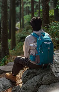 Outdoor hiking backpack forest scene showing multiple functional pockets and rich fine details.