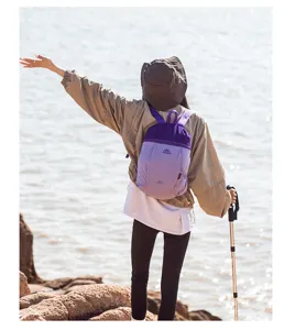 Lightweight outdoor purple backpack detail view, casual camping travel daypack for hiking.