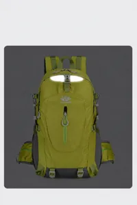 Detail shot of army green outdoor backpack showing reflective safety strip and front zipper pocket.