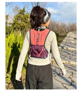 Outdoor running vest backpack detail view, featuring lightweight breathable fabric and zipper pocket.