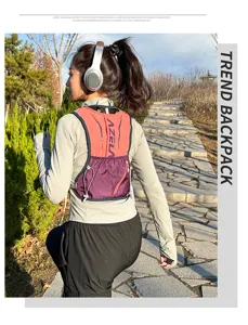 Outdoor running backpack vest detail shot, featuring pink and purple ergonomic sports design.