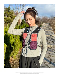 Outdoor trail running vest backpack detail view featuring multi-pocket storage and comfort fit.