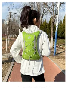 Lightweight green hydration backpack for outdoor running, cycling, and marathon sports.