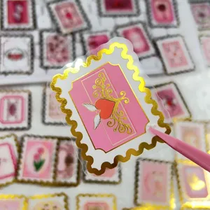 Gold stamping transparent PET journaling sticker with cute pink heart and angel wings pattern.