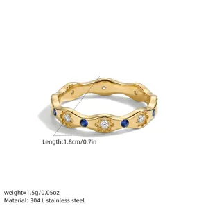 Roestvrijstalen golvende ring met bloemzirkonia en blauwe stenen voor dagelijks gebruik.