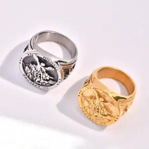 Men vintage stainless steel St Michael angel signet ring religious jewelry detail shot