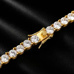 Close-up detail shot of 5mm mens hip hop tennis chain, gold tone copper paved cubic zirconia stones.