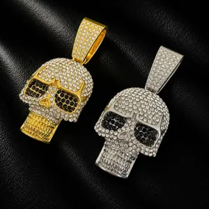 Full rhinestone skull pendant detail close-up showcasing sparkling crystals and gothic hip hop style.