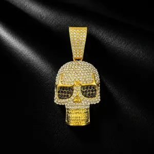 Gold rhinestone skull pendant necklace detailed view, hip hop punk street style accessory for men.