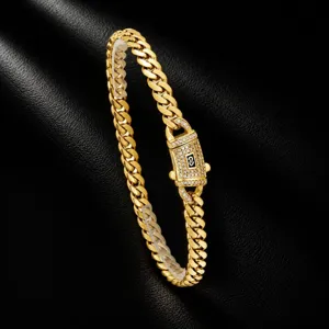 Detailed close-up of the gold-tone cubic zirconia lock curb chain necklace showing sparkling stones.