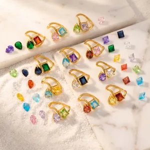 Detailed view of gold-plated titanium steel ring with interchangeable colorful birthstone crystal gems.