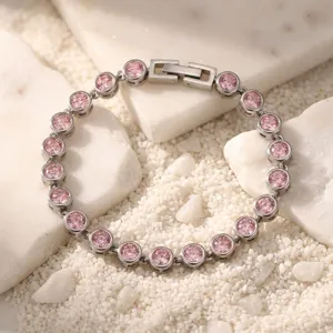 Exquisite detail view of pink zircon tennis bracelet, bezel-set design in durable titanium steel.