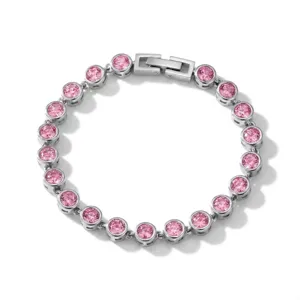Detailed view of the bezel-set pink cubic zirconia tennis bracelet in stainless steel.