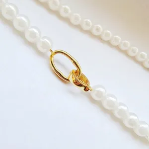 DIY pearl necklace metal clasp accessory detail view, premium golden connector buckle.