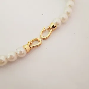 Gold plated jewelry clasp with small stones and white pearls for DIY necklace bracelet making.