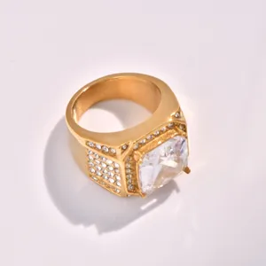 Close-up detail of the luxury gold-plated men's ring featuring large square cubic zirconia.