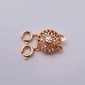 Roségoldfarbene mehrreihige Schmuckschließe, runder Steckverschluss mit Sonnenblumen-Muster.