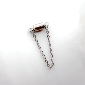 Stainless steel magnetic clasp detail shot, secure jewelry connector link for necklaces.