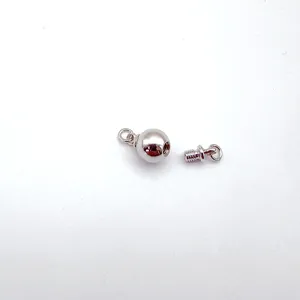 Close-up detail of silver ball screw clasp component, perfect for DIY jewelry making findings.