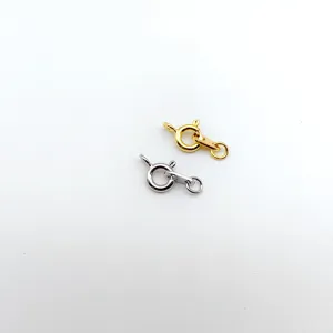 Gold and silver spring ring clasps detail, perfect for DIY jewelry making and necklace ends.