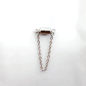 Stainless steel magnetic jewelry clasp with secure extension chains for necklaces.