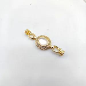 Gold DIY mother of pearl jewelry clasp detail view, elegant shining zircon connector.