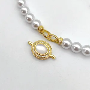 DIY gold plated pearl necklace clasp connector with mother of pearl and clear crystals.