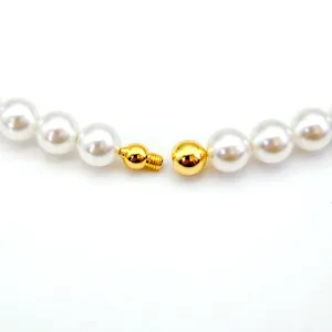 Gold screw clasp detail for pearl necklace, copper plated 18k gold fine jewelry component.