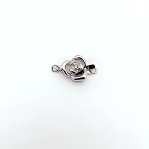 Detailed close-up of silver camellia flower clasp with crystal for DIY necklace making.