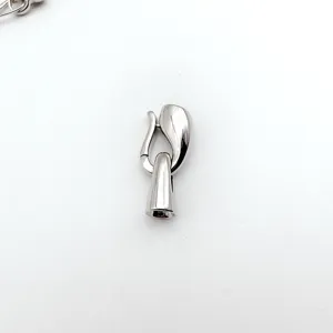 Close-up of silver-tone metal jewelry clasp finding for DIY necklace and bracelet crafting.