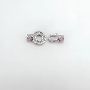 Close up of silver rhinestone jewelry clasp connector detail, shiny cubic zirconia design.
