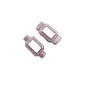 Fermoir de collier et bracelet en or rose avec zircones et nacre pour bijoux élégants.