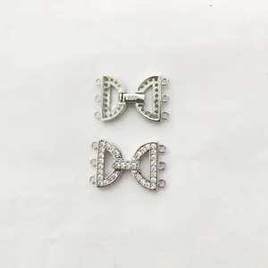 Close-up view of micro-paved zirconia three-row jewelry clasp for DIY pearl necklace design.