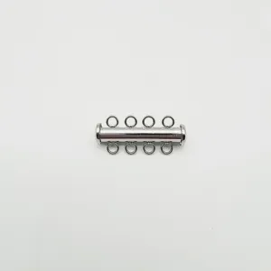 Close-up detail of silver stainless steel multi-strand tube clasp for DIY jewelry making.