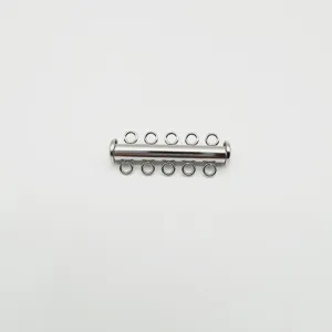 Close-up detail of silver multi-strand tube clasp, stainless steel jewelry DIY finding.