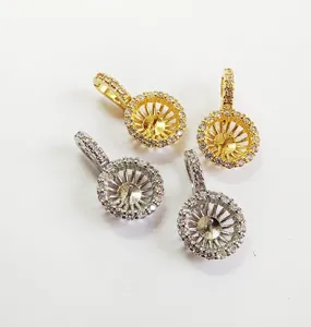 Detailed shot of micro-pave cubic zirconia jewelry bail findings, pearl pendant tray connectors.