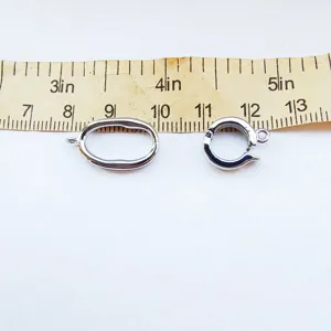 DIY metal jewelry clasps set, oval link and spring ring for necklace bracelet crafting.