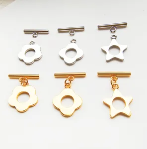Close-up of DIY jewelry toggle OT clasps featuring cute flower and star charms in gold and silver.